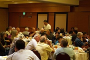 C12-6-10-Live auction bidders at work