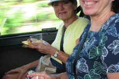 Mollie Howell and Jo Anne Martinez enjoying breakfast on the bus