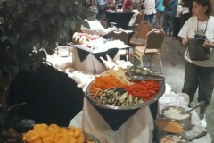 Jo Anne Martinez checking the food set-up for the host chapter social