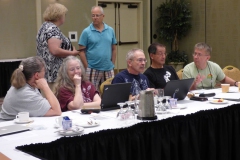 Board members chatting during a break