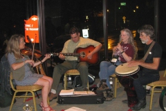 Julie Mavity-Hudson and her husband Eddy (right) with other members of the Fiddle and Pick Caeli Band (Gretchen Priest May and Tony Novak)