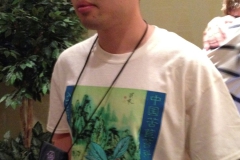 Hong Xin wearing the Society’s new tee-shirt he helped design featuring Hemiboea roseoalba