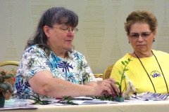 Karyn Cichocki and Jill Fischer demonstrating how to prepare a miniature design