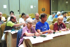 Workshop attendees doing their own designs with materials supplied