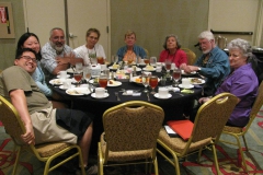 Group socializing over dinner