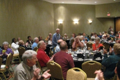 Michael Kartuz standing as Award of Appreciation recipient 32 years ago