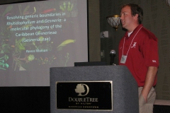 Reece Watson presenting his program on Rhytidophyllum and Gesneria
