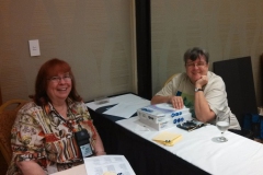 Flower Show Chair Karyn Cichocki (right) with Dale Martens helping during judging