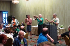 Auction team: Doris Brownlie, Tom Bruning, Michael Riley, Bill Price