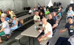 The group enjoying sitting down for a picnic lunch at the zoo