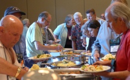 Filling plates at the Opening Dinner Buffet Filling plates at the Opening Dinner Buffet
