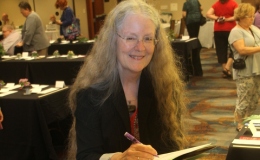 President Julie Mavity-Hudson signing the renewal MOU with the Gesneriad Conservation Center of China