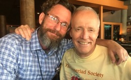 Brandon Erikson with Bill Price wearing the 2017 Society tee shirt designed by Carol Ann Bonner