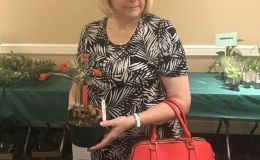 Judy Zinni with her color-coordinated Sinningia purchase Judy Zinni with her color-coordinated Sinningia purchase