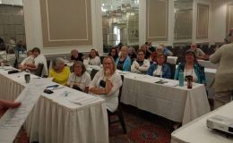 Workshop attendees listening intently