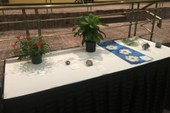 Live auction items on display after closing lunch
