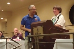 Hung Nguyen receiving the 2018 Seed Fund award from Karyn Cichocki