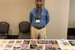 Editor Peter Shalit at publications sale table