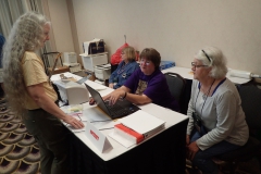 Entries Chair Karyn Cichocki (center)	busy entering