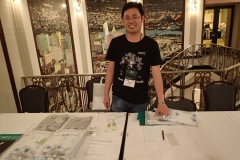 Hong Xin at GCCC fund-raising sale table of tee shirts from China