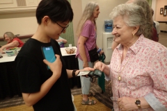 Registrar Mary Helen Maran welcomes Wendy Xu from China