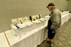 David Pierce perusing the artistic designs
