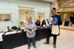 Convention Registrar Mary Helen Maran and bus volunteer Leonard Re