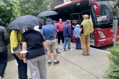 Re-boarding the bus in the rain