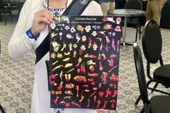 Laura with her poster of pics of Colombian gesneriad flowers