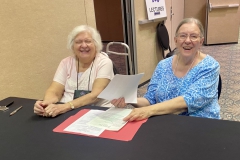 Doreen Hovermale and Lynette Miller at the Entries check-in table
