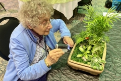 Anne Vidaver inspecting the show entries