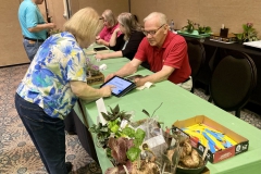 Cathleen Graves checking out at plant sales