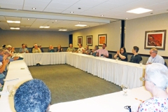 Brandon Erikson moderating an informal discussion group
