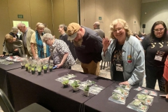 Group making selections at the door prize tables