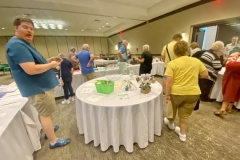Bidding just before closing the silent auction at 4:00 pm