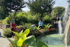 Phyllis and Patricia Savage and others enjoying the plantings and fountains