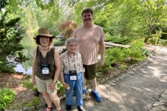 Maria Walueff, Anne Vidaver, and Jeremy Keene touring the garden