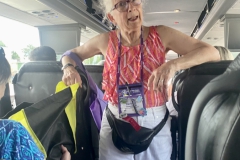 Special Events Chair Barbara Greenawalt on the bus leaving the garden