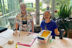 Convention Registrar Mary Helen Maran and volunteer Maureen Mark