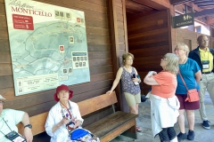 Group reading the Monticello map while awaiting their tour guide