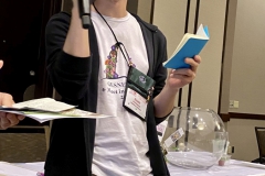 Scott Ammann singing his rendition of “Gesneriads Meet in St. Louis” as part of the 2024 local convention team invite