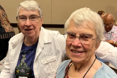 Sally Robinson and MJ Tyler, the 2022 Convention Co-Chairs relaxing