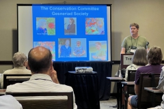 Jeremy Keene, Conservation Co-Chair presenting a conservation update