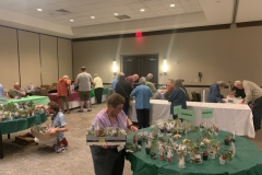 Susan Allison and others buying and checking out
